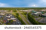 Aerial view towards suburbs of a city in central Kentucky with Lexington greens shopping plaza on Nicholasville road on the foreground