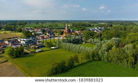 Aerial view towards the village of Puivelde, in East Flanders,  Belgium