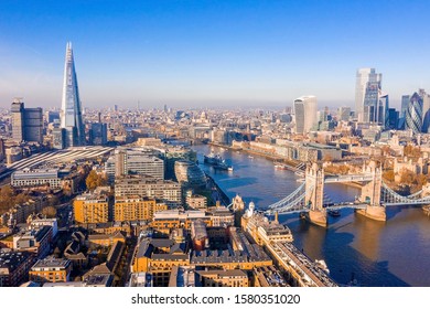 Aerial view of the Tower Bridge in London. One of London's most famous bridges and must-see landmarks in London. Beautiful panorama of London Tower Bridge. - Shutterstock ID 1580351020
