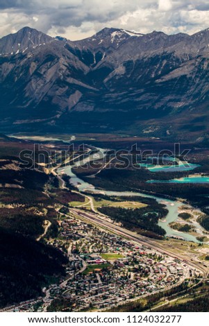 Aerial view of the town of Jasper, Alberta, Canada from Whistlers mountain. Jasper National Park. Athabasca river, fot hills of The Rocky Mountains, tourism. Portrait layout. Canadian, picturesque.