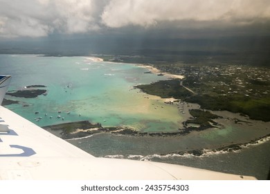 Aerial view of the town of Puerto Villamil from the air, after taking off at the Isabela Island airport, Galapagos. - Powered by Shutterstock