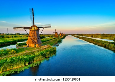 Aerial view of traditional windmills in Kinderdijk, The Netherlands. This system of 19 windmills was built around 1740 and is a UNESCO heritage site.