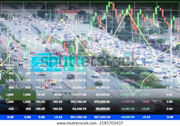 Aerial view of\
traffic jam in Bangkok, Thailand with graph, chart, candlesticks\
and data information for energy consumption and power management\
stock industrial\
background.\
