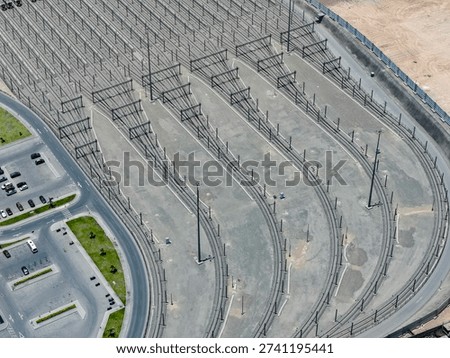 Aerial view of a train station with multiple railways ready to receive high-speed trains.