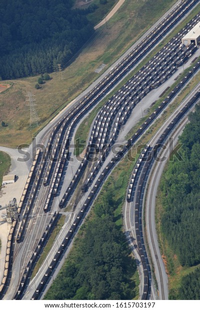 Aerial View of\
trainyard full of train cars\
