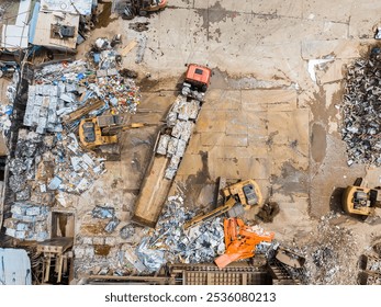 Aerial view of Trash disposal for recycling and re-use. Recycling of Construction waste or debris Industrial scrap Processing. - Powered by Shutterstock