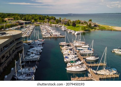 Aerial view of Traverse city marina in Michigan with several boats docked - Shutterstock ID 2079450193