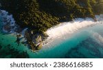 Aerial view of a tropical Albany Middleton Beach with white sand  and azure blue waters