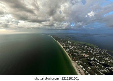 Aerial View Of Tropical Storm Over Rich Neighborhood With Expensive Vacation Homes In Boca Grande, Small Town On Gasparilla Island In Southwest Florida