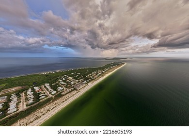 Aerial View Of Tropical Storm Over Rich Neighborhood With Expensive Vacation Homes In Boca Grande, Small Town On Gasparilla Island In Southwest Florida