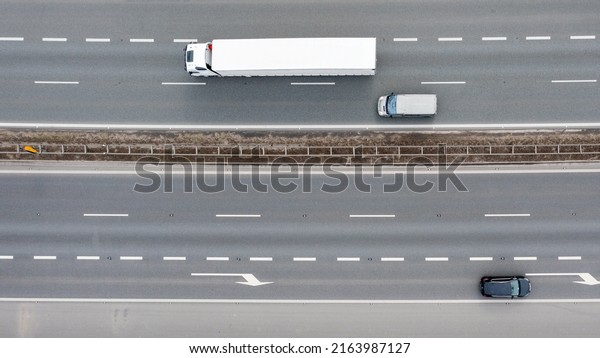 Aerial view of truck\
moving on the road