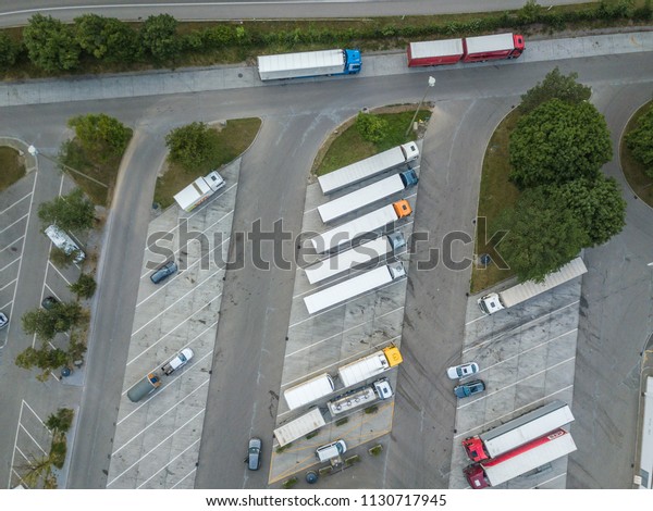 Aerial view of\
truck parking lot in\
Switzerland