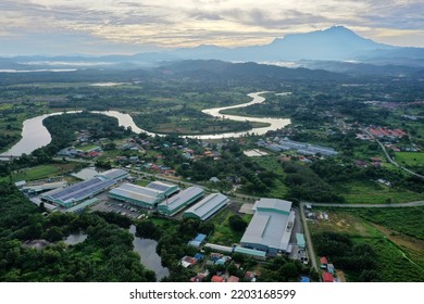 Aerial view tuaran city with mount kinabalu background - Shutterstock ID 2203168599