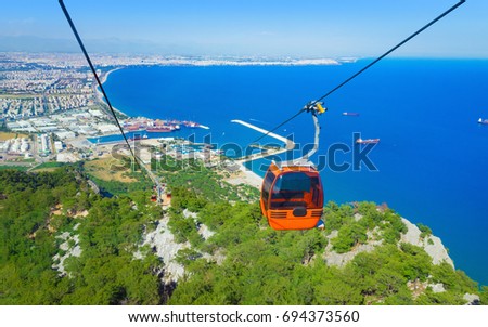Aerial view Tunektepe Cableway, beautiful blue Gulf of Antalya and popular seaside resort city Antalya, Turkey Stock photo © 
