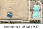 Aerial view of two small empty pools on a terrace of a building.