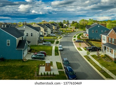 Aerial View Of Typical American New Construction Neighborhood Street In Maryland For The Upper Middle Class, Single Family Homes USA Real Estate