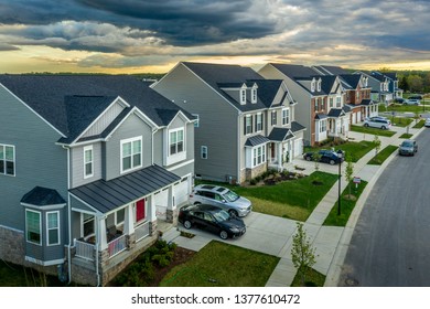 Aerial view of typical American new construction neighborhood street in Maryland for the upper middle class, single family homes USA real estate