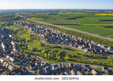 Aerial view of uk home newly built estate development masterplan landscape in England,