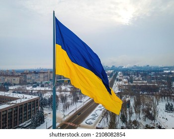 The aerial view of the Ukraine flag in winter - Shutterstock ID 2108082854