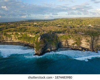 Aerial view of Uluwatu Temple (Pura Luhur Uluwatu) Balinese Hindu temple located in Uluwatu sea. It is renowned for its magnificent location, perched on top of a cliff.