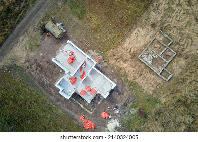 Aerial View Of Unfinished Frame Of Private House Foundation Under Construction