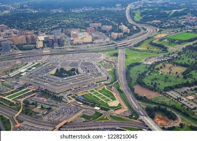 Aerial view of the United States Pentagon, the Department of Defense headquarters in Arlington, Virginia, near Washington DC, with I-395 freeway and the Air Force Memorial and Arlington Cemetery nearb