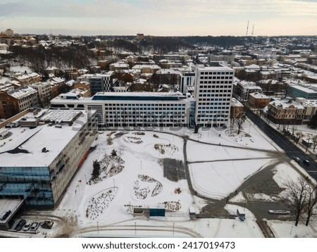 An aerial view of Unity square with office buildings in Kaunas, Lithuania in winter.
