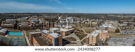 Aerial view of University of Maryland Baltimore County UMBC Catonsville admission office, pool, commons, quad, Honors college, admission office, retriever activities center, kuhn plaza, erickson field