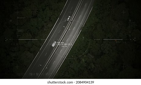 Aerial View Of Unmanned Aerial Vehicle UAV Or Reconnaissance Drone Monitoring Highway Traffic Tracking And Targeting Suspect Moving Vehicle