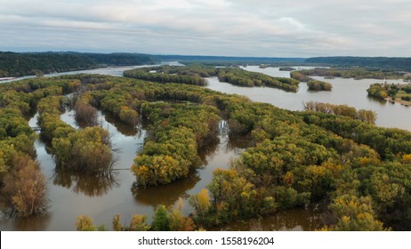 Aerial View Of Upper Mississippi River (bottomland Forests, Open Water, Wetlands, Islands) At Wisconsin Minnesota Border. Autumn Fall Season (october). Landscape From Above, Drone Shot. Sunrise, Sunny