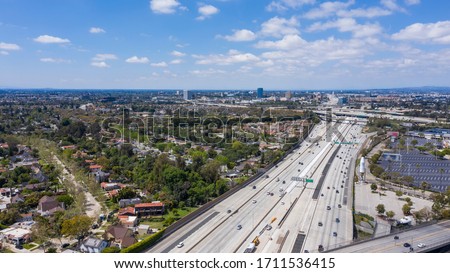 Aerial view of the urban core of downtown Santa Ana, California with clear views extending into Anaheim.