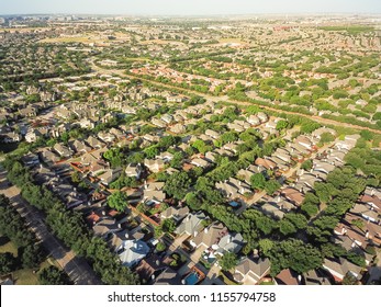 Aerial View Urban Sprawl Near Downtown Dallas, Texas, USA. Suburban Tightly Packed Homes Neighborhood With Driveways, Apartment Building Complex Flyover. Vast Suburbia Subdivision In Irving, Texas, US