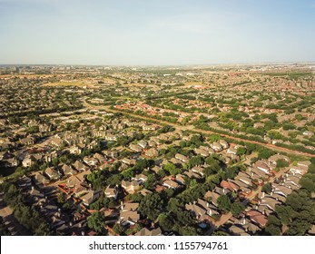 Aerial View Urban Sprawl Near Downtown Dallas, Texas, USA. Suburban Tightly Packed Homes Neighborhood With Driveways, Apartment Building Complex Flyover. Vast Suburbia Subdivision In Irving, Texas, US