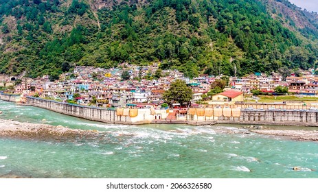 An aerial view of Uttarkashi town along the Bhagirathi river (Ganga river) - Shutterstock ID 2066326580