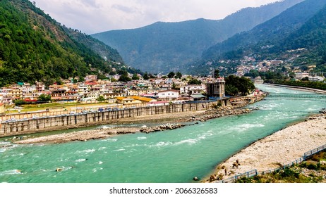 An aerial view of Uttarkashi town along the Bhagirathi river (Ganga river) - Shutterstock ID 2066326583