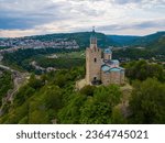 An aerial view of Veliko Tarnovo reveals a Bulgarian city rich in history and culture, with its beautiful buildings, streets, and picturesque hills.