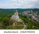 An aerial view of Veliko Tarnovo reveals a Bulgarian city rich in history and culture, with its beautiful buildings, streets, and picturesque hills.