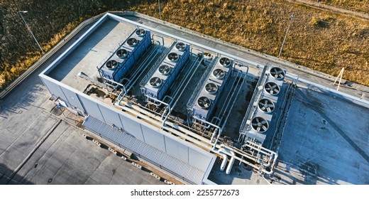 Aerial view of ventilation and air conditioning system on the roof of building.	