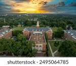 Aerial view of Virginia Hall, central building of Virginia State University public historically Black land-grant university in Ettrick with dramatic colorful sunset sky