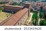 Aerial view of the Visconti castle of Pavia in Lombardy. large ancient fortress and splendid seat of a refined court. Museum and Italian cultural heritage in the tourist city of Pavia, Italy.