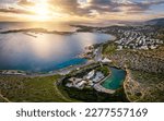 Aerial view of the Vouliagmeni district in south Athens, Greece, with the lake and Asteras peninsula during sunset time