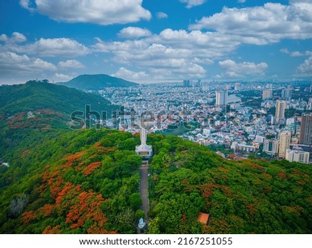 Aerial view of Vung Tau with statue of Jesus Christ on Moutain . the most popular local place. Christ the King, a statue of Jesus. Travel concept.