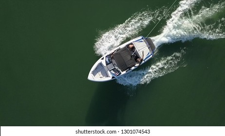 Aerial view of wakeboarder wakeboarding after a boat, virelade, gironde, france