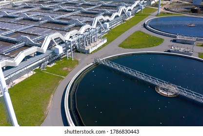 Aerial View Of The Wastewater Treatment Plant. Pumping Station And Drinking Water Supply. Industrial And Urban Water Treatment For A Big City. Round Sedimentation Tanks.
