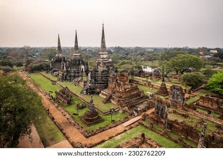 Aerial view of Wat Phra Si Sanphet, Ayutthaya temple in Thailand. Ayutthaya Historical Park has been considered a World Heritage Site by UNESCO.