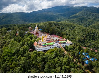 Aerial view of Wat Phra That Doi Kham Temple on the top of mountain in Chiang Mai, Thailand.
