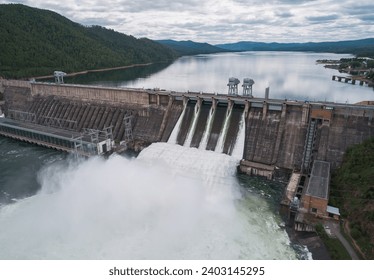 Aerial view of water discharge at hydroelectric power plant