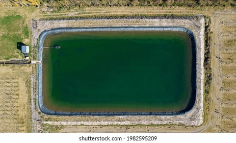 Aerial View Of A Water Tank (pool) For Irrigation In Agriculture.