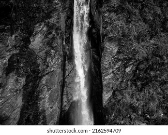 Aerial View Of A Waterfall In The Peruvian Andes. Fresh Water Source From High Mountain.