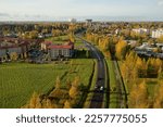 Aerial view of simonkylaÌˆ watertowers and beatiful urban autumn nature in Vantaa Finland